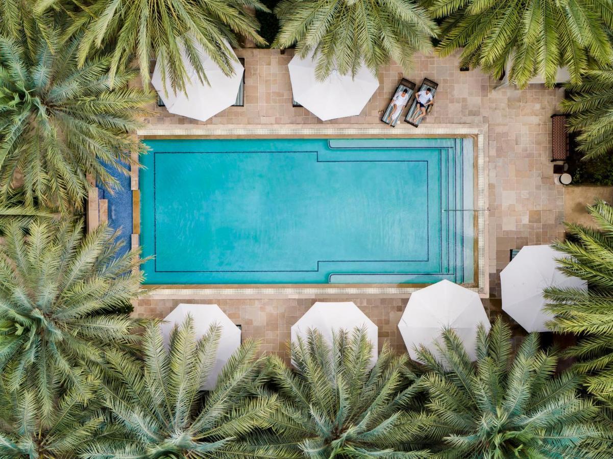 Jumeirah Dar Al Masyaf Ντουμπάι Εξωτερικό φωτογραφία Aerial view of the pool at the Four Seasons Hotel